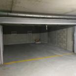 Parking "double box" intérieur avec porte dans quartier sécurisé